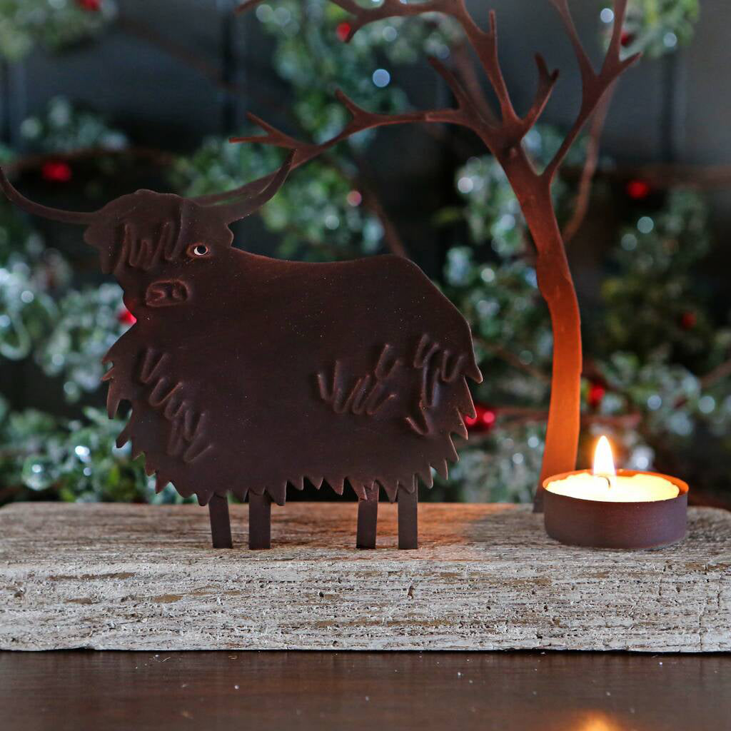 Highland cow tea light shop holder