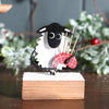 Christmas Sheep On Block With Bagpipes